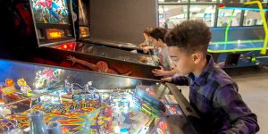 Kids playing arcade games